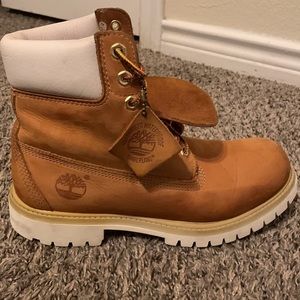 Timberland boots tan and white size 7 medium i think kind of new